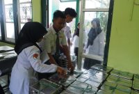 Proses pendistribusian menu MBG di MAN 2 Pamekasan, (Dok. MAN 2 Pamekasan)