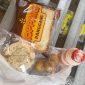 Menu MBG untuk siswa di Banyupelle diantaranya sebungkus roti, yakult, kripik tempe dan 4 buah klengkeng dikemas plastik