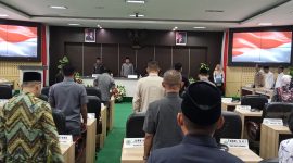 Rapat paripurna DPRD Kabupaten Pamekasan membahas jawaban Bupati atas pandangan fraksi terkait empat Raperda strategis, termasuk transformasi digital dan penguatan tata kelola pemerintahan daerah.