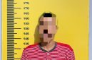 Tersangka diamankan polisi 