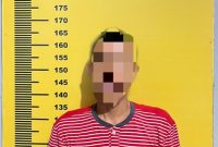 Tersangka diamankan polisi 